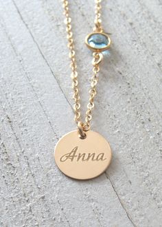 "NOTE! THIS ITEM WILL BE SHIPPED FROM THE USA!! ALL ENGRAVED JEWELRY AND RINGS ARE SHIPPED FROM THE USA This is and elegant and dainty initial and birthstone necklace in gold filled or sterling silver. We can engrave your mom's, sister's, friend's, any loved one's initial, birthday, name and pair it with a sparkly Swarovski birthstone. DETAILS: - Gold filled or sterling silver cable chain necklace 15-18\" - 12mm gold filled/ sterling silver engraved disc - 6mm Swarovski birthstone ORDERING: ~ Pl Personalized Necklaces For Mom's May Birthstone, Mother's Day Birthstone Necklace With Name On Round Pendant, Personalized Dainty 14k Gold Birthstone Necklace, Mother's Day Name Birthstone Necklace With Round Pendant, Mother's Day Round Pendant Birthstone Necklace With Name, Personalized Birthstone Name Necklace For Mother's Day, Personalized Mother's Day Birthstone Necklace Round Pendant, Personalized Birthstone Necklace For Mother's Day, Personalized Round Pendant Birthstone Necklace For Mother's Day