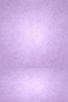 an old purple paper textured with some light pastel colors on the top and bottom