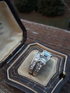 Absolutely Stunning 14k White Gold, Approximately 3ct Emerald Cut and Princes Vut Diamond Wedding Set... 2 rings, Wedding Ring and Engagement Ring Attached.. Center Emerald Cut Diamond is Approximately 6.75mm x 4.75mm, (about 1ct), I put 0.75ct .... Smaller Emerald cut Diamonds are Approximately 5.50mm x 3.50mm, which Approximately 0.45ct Each. SI, GH... Wedding band is 1ct Approximately. My Estimate is 3ct total I can get Professional Appraisal for $100 extra. It's my Estimate, all Approximatel Dazzling Baguette Cut Rings For Anniversary, Wedding Jewelry In Platinum With Emerald Cut, Emerald Cut Cubic Zirconia Anniversary Jewelry, Wedding Jewelry Platinum With Emerald Cut, Wedding Jewelry With Emerald Cut Platinum, Platinum Wedding Jewelry With Emerald Cut, Channel Set Emerald Cut Diamond Ring For Wedding, Anniversary Platinum Radiant Cut Ring, Anniversary Platinum Wedding Ring Radiant Cut