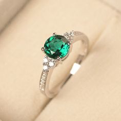 Round Emerald Engagement Ring, Emerald Ring With Brilliant Cut For Promise, Round Emerald Birthstone Ring With Brilliant Cut, Emerald Birthstone Ring With Brilliant Cut, Emerald Ring For May Birthstone In Brilliant Cut, Emerald Ring Brilliant Cut May Birthstone, Emerald Ring Brilliant Cut For May Birthstone, Emerald Promise Ring With Brilliant Cut, Emerald Promise Ring With Center Stone