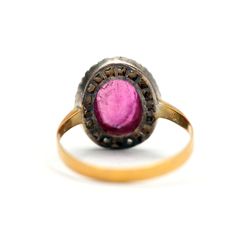 If you love glittery rose cut diamonds and hot pink juicy tourmalines, this ring is for you. Stones are set in silver to keep the diamonds white and sparkly, the band is solid buttery 18k yellow gold. Tourmaline measures 10mm x 8mm, ring face measures 13.69mm x 11.5mm. Ring size 7. Sizing available Layaway available