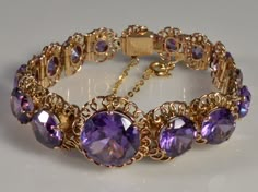 "The bracelet has absolutely mesmerizing effect on anybody who is seeing it. A long array of 15 graduated color changing lab Alexandrites set into rose gold filigree links. Alexandrites thought to bring luck, good fortune and love. The gemstones are changing the color from deep amethyst like purple under the sun light or daylight bulbs to blue sapphire color under yellowish candle light, or incandescent bulb. The gems are eye clear with some minuscule inclusions visible with magnifying glass. Th Antique Alexandrite Jewelry, Luxury Exquisite Gemstones For Formal Occasions, Luxury Elegant Gemstones For Formal Occasions, Unique Luxury Jewelry With Rectangular Stone, Luxury Gold Amethyst Bracelet, Luxury Elegant Gemstones With Accents, Luxury Elegant Gemstones For Collectors, Luxury Elegant Collectible Gemstones, Alexandrite Jewelry Vintage