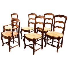 Six dining chairs from 19th century. Massive walnut hand carved frame with floral accents and rush seats. Five chairs and one armchair with lower back. All in good condition. Could be sold separately. French Provincial Dining Chairs, Carved Dining Chairs, French Country Dining Chairs, Rustic Oak Furniture, Mismatched Chairs, French Dining Chairs, Provincial Style, Farmhouse Kitchens, Vintage Dining Room