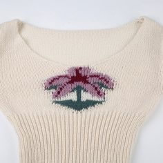 Introducing the Maiya Palm Knit Sweater, a perfect blend of cozy comfort and playful style. Crafted from soft, high-quality knit fabric, this sweater offers a snug fit that flatters your figure while keeping you warm. The standout feature is the charming palm tree design embroidered on the front, adding a touch of whimsy to your everyday look. The off-white color makes it versatile, easy to pair with your favorite jeans or skirts for a chic, laid-back ensemble. With its long sleeves and subtle s Soft Knit Cotton Sweater, Comfortable Cotton Soft Knit Sweater, White Knitted Acrylic Sweater, Comfortable Soft Knit Cotton Sweater, Beige Crew Neck Acrylic Top, Beige Acrylic Crew Neck Top, Cozy Cotton Knitted Sweater, Cozy Fit Knitted Cotton Sweater, Cozy Knitted Cotton Sweater