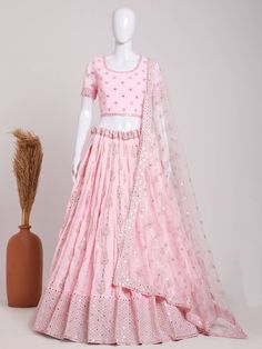 Introducing the "alluring baby pink sequins georgette bridesmaid lehenga choli" from Ethnic Plus, a stunning ensemble designed to make you look and feel like a princess. This ethereal lehenga choli set is crafted with meticulous attention to detail, featuring a beautiful baby pink color heavy georgette material lehenga adorned with sequin work, embroidery work, and mirror work. Paired with a similar color heavy georgette material choli, embellished with exquisite embroidery and mirror work, and Light Pink Bridal Lehenga, Baby Pink Wedding, Pink Bridal Lehenga, Wedding Lehenga Choli, Georgette Material, Indian Wedding Lehenga, Bridesmaid Lehenga, Indian Party, Indian Party Wear