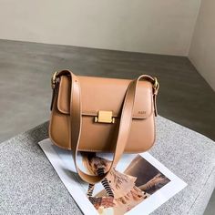 A fashionable and easy to match small square bag that doesn't pick people or seasons, and doesn't choose outfits. It easily adds points and brightens up your look.👍 Using comfortable cowhide fabric with clear patterns, the bag body appears full and three-dimensional, soft and skin friendly, showcasing an elegant temperament.👍 👍Fine leather, high quality accessories, and Adjustable length should strap. Dimensions:9.06inches length, 3.15cm wide, 5.91inches high Note： 1)If you have any questions, please contact me before placing an order. 2)Since all the items are made to order by hand, returns and exchanges couldn't be accepted. 3)Product dimensions are measured in kind and may have slight errors. 4)Due to factors such as lighting, environment, and display during shooting, there may be sl Trendy Square Shoulder Bag For Daily Use, Trendy Fall Box Bag For Office, Trendy Office Box Bag For Fall, Trendy Fall Office Box Bag, Trendy Rectangular Shoulder Bag Gift, Fall Shopping Baguette Bag, Fall Shopping Rectangular Baguette Bag, Fall Square Shoulder Bag With Mobile Phone Pocket, Trendy Beige Rectangular Box Bag