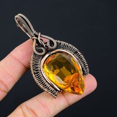 Handmade Copper Chain Size 18-20Inch - https://www.etsy.com/in-en/listing/1162990726 Welcome to our little shop, where you can find handmade copper wire jewelry and more, for you and your loved ones. We do accept custom orders also, kindly message us for more. Citrine Pendant Copper Wire Wrapped Pendant Citrine Gemstone Pendant Copper Jewelry Handmade Pendant Citrine Jewelry Gift For Her Mother Gemstone : Citrine  Pendant length : 7.5 Cm Metal : Copper  * Protection:- Copper will be tarnished after a while so try to limit contact with lotions, soaps or anything moist and never wear it in the shower, swimming or anywhere else it may come in contact with water. If tarnish becomes an issue, you may clean this item with jewelry cleaning cloth or ultra polishing pads. * Packing:- Your jewelry a Handmade Orange Citrine Jewelry, Bohemian Jewelry For Halloween Gift, Handmade Yellow Copper Jewelry, Handmade Amber Crystal Necklace Gift, Handmade Amber Crystal Necklace For Gift, Hand Wrapped Orange Jewelry Gift, Hand Wrapped Orange Jewelry For Gift, Handmade Jewelry For Halloween Gift, Handmade Jewelry Gift For Halloween