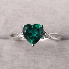 ◆ The ring is handcrafted from sterling silver and decorated with a dazzling 8*8 mm emerald and CZs. It is suitable for engagement/anniversary/daily occasion. ◆ Production Description: Main stone Type: Lab Emerald Main Stone Shape: Heart Cut Main Stone Size: 8*8 mm(1.59ct) Side stone: CZ Metal: 925 Sterling silver - Other options available in the drop down menu ◆ Customization: √Free for Add Engraving √Other Metal Type Available √Other Gemstones & Shapes Available √Personalization Requests Avail Green Fine Jewelry Heart Ring For Wedding, Green Heart Cut Rings For Wedding, Green Wedding Rings For Valentine's Day, Green Heart Cut Wedding Rings, Heart Cut Diamond Emerald Ring For Wedding, Fine Jewelry Green Heart Ring For May Birthstone, Green Heart Ring For May Birthstone, Fine Jewelry Style, Heart Cut Emerald Ring For Anniversary, Green Heart Ring For Wedding With May Birthstone