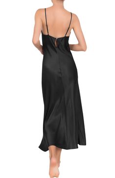 Fall in love with this smooth, satiny nightgown designed in a slinky silhouette with slender adjustable straps. 100% rayon Hand wash, dry flat Made in the USA of imported fabric Black Owned and Founded Satin Finish V-neck Nightgown For Loungewear, Night Dress With Delicate Satin Straps, Satin Night Dresses With Delicate Straps, Delicate Straps Sleep Dress, Elegant Slip Dress With Delicate Straps For Night, Elegant Cami Slip Dress For Bedtime, Satin Dress With Delicate Straps For Night, Elegant Slip Dress With Satin Trim And Spaghetti Straps, Modal Satin Sleepwear With Spaghetti Straps