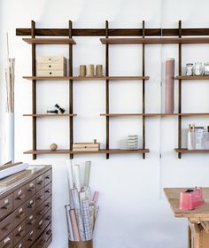 the shelves are lined with books and other items