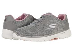 SKECHERS Performance Go Walk 6 - Magic Melody - Women's Shoes : Gray/Pink : You'll catch these amongst your favorites! The SKECHERS Performance Go Walk 6 - Magic Melody featuring a classic lace-up style running sneaker constructed with a well bedded footbed for all day wear. Textile upper. Textile lining and insole. Synthetic outsole. Imported. Measurements: Weight: 8 oz Product measurements were taken using size 9, width B - Medium. Please note that measurements may vary by size. Weight of foot Gray Lace-up Sneakers, Comfortable Gray Lace-up Running Shoes, Boost Midsole Lace-up Running Shoes, Gray Lace-up Sneakers With Cushioned Footbed, Gray Cushioned Lace-up Sneakers, Comfortable Low-top Sneakers For Running Errands, Comfortable Low-top Sneakers For Errands, Gray Walking Shoes With Cushioned Footbed For Jogging, Comfortable Gray Running Shoes With Athletic Fit