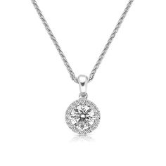 Surprise the one you adore with this classic 18K white gold Diamond Halo Pendant Necklace. The shimmering pendant showcases a classic round brilliant cut diamond artfully set to enhance size and sparkle - wrapped in a pave-lined white diamond halo. This radiant look is one she'll turn to often, everyday and on special occasions. An amazing and thoughtful anniversary gift for your loved one
0.50 carat round brilliant cut F VS1 -CGL report
0.09 carat pave
18k white gold
The Pendant desig Timeless Diamond White Round Pendant Necklace, White Gold Diamond Necklace With Round Pendant, Classic Round Diamond Necklace With Halo Design, Sterling Silver Diamond White Necklace With Halo Design, White Diamond Necklace With Brilliant Cut, Timeless White Diamond Necklace, Diamond White Diamond Necklace With Brilliant Cut Round Pendant, Diamond White Solitaire Necklace With Halo Design, White Solitaire Necklace With Diamond Cut Round Pendant