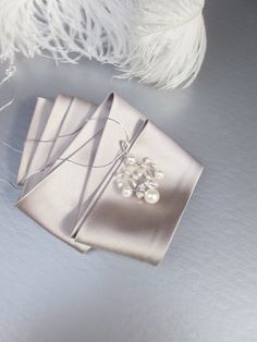 "This delicate floral pendant is hand made using Premium Quality European Crystal and fine quality cultured freshwater pearls. Available in gold, rose gold or silver finish. The pendant measures 1 3/4\" long and 1 1/4\" wide. The necklace is 18\" long. For the matching earrings please take a look here: https://www.etsy.com/listing/684400559/bridal-pearl-earrings-crystal-and?click_key=e783273204a3125b36345a6867ca87f500487c95%3A684400559&click_sum=f5090d17&ref=shop_home_active_66&frs=1 https://www Delicate Pearl White Pendant Necklace, Elegant Bridal Pendant Necklace With Pearls, Pearl Embellished Pendant Jewelry Gift, Pearl Embellished Pendant Jewelry For Gifts, Elegant Pendant Pearl Necklace For Wedding, Elegant Pearl Pendant Necklace For Wedding, Elegant Pearl Necklaces For Gifts, Elegant Pearl Necklaces As Gift, Elegant Wedding Pearl Pendant Necklace