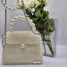 All our bags are handmade and made with a lot of love. Each bag is a special accessory. Our bags are perfect for any event and are sure to make you stand out from the crowd. Ivory color beads, not white! Bag size: 17 (14)x12x5 cm beads Strap -110cm The bag is tightly woven.  Any question will be glad to answer by messages! Please include your phone number when ordering, it is necessary for the postage of the parcel for you! Top Handle Mobile Phone Clutch Bag As Gift, Beaded Pearl Bags For Parties, Top Handle Clutch For Mobile Phone As Gift, Square Beaded Shoulder Bag For Gifts, Square Shoulder Bag With Pearl Handle As Gift, Rectangular Evening Bag With Pearl Embroidery For Gift, Beaded Top Handle Bag As Fashion Accessory, Rectangular Pearl Embroidery Evening Bag As Gift, Rectangular Pearl Embroidery Evening Bag