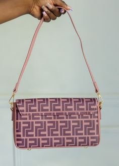 Our Jennifer Shoulder Bag is THE everyday piece. The DOUBLE P PRINT and gold accents this is a very eye catching vibe. Being one of our best sellers this stunning bag has plenty of inner storage where you can store all of your essentials. Length: 10 inches Width: 5 inches Height: 5.5 inches Trendy Purple Satchel With Detachable Strap, Trendy Purple Shoulder Bag For Travel, Chic Purple Shoulder Bag For Travel, Trendy Purple Everyday Satchel, Trendy Purple Satchel With Removable Pouch, Chic Purple Box Bag For Everyday Use, Trendy Purple Satchel For Everyday Use, Trendy Purple Satchel Bag, Trendy Purple Bags For Daily Use