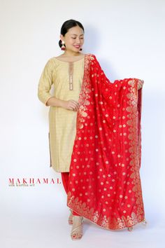 Soft golden straight kurta set with Banarasi silk red dupatta. Available in only size 38 (UK: 10-12) It has hand emb. details on the tops . Model: UK size 8, Height: 5'2 . If interested please message us.  -Makhamali Red Semi-stitched Slub Silk Churidar, Red Slub Silk Traditional Wear With Dupatta, Red Unstitched Slub Silk Churidar, Unstitched Red Slub Silk Churidar, Red Traditional Slub Silk Kurta, Traditional Red Slub Silk Kurta, Red Slub Silk Traditional Churidar, Festive Slub Silk Churidar With Resham Embroidery, Gold Slub Silk Salwar Kameez With Resham Embroidery