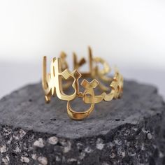 Our jewelry is always long lasting, beautiful, and of the highest quality. Our Persian (Farsi) and Arabic items are classic, unique pieces that are worth the investment. Personalize your ring with this beautiful writing. We are happy to translate for you and we can't wait for you to fall in love with your very own piece.DETAILS- Crafted with pure sterling silver and optional gold-plating OR pure solid gold- Due to different finger sizes, each ring may vary slightly from photos.- Made in New York Unique Gold Engraved Ring Gift, Unique Engraved Gold Ring For Gift, Hallmarked Nameplate Jewelry For Wedding, Unique Yellow Gold Engraved Ring, 14k Gold Jewelry With Engraved Text, Unique Gold Engraved Promise Ring, Elegant Formal Ring Engraved With Name, Custom Name White Gold Jewelry For Promise, Elegant Silver Nameplate Ring