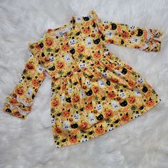 Features- 95% Cotton 5% Polyester Very Stretchy Functional Buttons Ruffles At Shoulder And Sleeve Edge Measurements- 90(2t) Length 17.5 In/ Sleeve 11 In./ Bust 10 In Cute Yellow Dress For Costume Party, Yellow Long Sleeve Dress For Playtime, Cute Fall Dresses For Costume Party, Cute Dresses For Fall Costume Party, Cute Dresses For Costume Party In Fall, Girls Boutique Dresses, Terry Cloth Dress, Fox Dress, Cupcake Dress