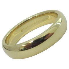 TIFFANY & Co. Forever 18K Yellow Gold 4.5mm Lucida Wedding Band Ring 5.5 Metal: 18K Yellow Gold Size: 5.5 Band Width: 4.5mm Weight: 5.80 grams Hallmark: ©TIFFANY&CO. AU750 Condition: Excellent condition, like new Tiffany price: $1,460 Authenticity Guaranteed Tiffany And Co, Tiffany & Co., Wedding Ring Bands, Band Rings, Metallica, Wedding Bands, Jewelry Rings, Wedding Rings, Yellow Gold