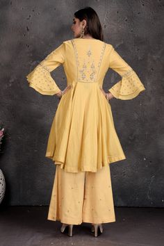 Be a vision of style and elegance on wedding celebrations in this beautiful light yellow palazzo suit with grey dupatta. Shop Indian dresses in USA from Pure Elegance. Designer Yellow Palazzo Set With Chikankari Embroidery, Designer Yellow Chikankari Embroidery Palazzo Set, Yellow Anarkali Palazzo Set With Straight Kurta, Elegant Yellow Palazzo Set With Traditional Drape, Yellow Floor-length Kurta With Cutdana, Elegant Yellow Palazzo Set For Eid, Yellow Palazzo Set With Mirror Work For Eid, Elegant Yellow Kurta With Mirror Work, Wedding Yellow Palazzo Set With Straight Kurta