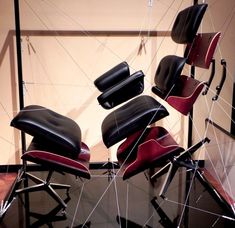 several chairs are arranged in the shape of an x - ray frame with strings attached to them