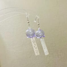 Elevate your style with these handmade earrings - an ideal blend of culture, craftsmanship, and elegance. They're perfect for any occasion!  🤍 Made with high-quality hand crafted wind chime style glass charms, adorned with glass crystal beads and resin pendants, you may choose to have clover charms or not, both designs are absolutely eye catching jewelleries!  🤍Three stunning colours available, if you want to swap the dangle plates, I am happy to customise them for you. 🤍Finish with silver pl Wind Chime Earrings, White Crystal Pierced Earrings As Gift, White Pierced Crystal Earrings As Gift, White Pierced Crystal Earrings For Gifts, Elegant Clear Earrings As Gift, White Round Pierced Crystal Earrings, White Dangle Crystal Earrings Gift, Round Crystal Earrings As Gifts, Pierced Round Crystal Earrings As Gift