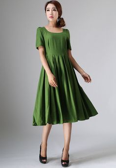 "This Prairie Linen dress is designed with soft linen in forest green hues, perfect with Puff sleeve, round neckline, and back button closure, This womens swing dresses can be styled with light weight a accessories for a daring ensemble . vintage inspired design, Handmade by Xiaolizi. DETAILS 50% linen, 50% Cotton, Medium weight Linen No lining Square neckline Short Puff Sleeve Seam pockets Back Zipper Below Knee length Spring, Summer House dress More color and More size https://etsy.me/2TGUAgq Casual A-line Dress With Pleated Bodice, Green Pleated A-line Maxi Dress, Dark Green Knee-length Summer Dress, Flowy Green Midi Dress Solid Color, Green Fitted A-line Pleated Dress, Casual Dark Green Short Sleeve Dress, Dark Green Knee-length Midi Dress For Summer, Spring Dark Green A-line Dress, Dark Green Short Sleeve Dresses For Spring