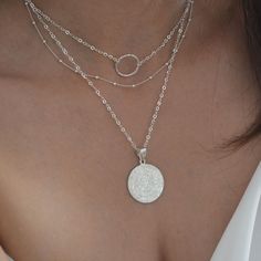 "Silver Disc Pendant! A beautiful Pendant representing part of Ancient Greece History. Available at 2 Necklace Lengths that cover all sizes: a. 15 inches plus 2 inch extender chain (covers 15\", 16\" and 17\") b. 18 inches plus 2 inch extender (covers 18\", 19\" and 20\") ---------------------- M A T E R I A L S: - You can choose length (16\"-20\"). - Chain and all of the metal components are sterling silver. - Diameter: 1 inch The disk can be read in a spiral direction from the outside rim to t Circular Silver Chain Jewelry, Sterling Silver Charm Necklaces For Layering, Silver Satellite Chain Jewelry For Layering, Sterling Silver Round Charm Necklaces For Layering, Sterling Silver Necklaces For Layering, Silver Jewelry With Satellite Chain For Layering, Sterling Silver Round Necklaces For Layering, Layered Round Chain Necklace, Silver Coin Pendant Jewelry For Layering