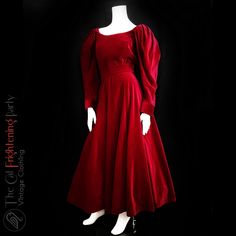 Absolutely stunning dress from Droopy & Brown label, designer Angela Holmes. Luscious scarlet red 100% cotton velvet in a sweeping romantic and dramatic renaissance dress style, bodice with black frogging fasteners at the back, wonderful puff sleeves and a lovely full ankle length skirt, lots and lots of fabric. In immaculate condition.  Labelled size 14, however since vintage sizes run small it is closer to a 10 in modern  UK sizing; * Underarm to underarm 18" * Across the waist at narrowest po Vintage Floor-length Dress For Costume Party, Vintage Long Sleeve Evening Dress, Vintage Victorian Ball Gown For Formal Occasions, Elegant Dress With Fitted Bodice For Theater, Vintage Floor-length Evening Dress, Regency Style Red Dress For Costume Party, Fitted Red Vintage Dress For Evening, Vintage Long Sleeve Formal Gown, Red Vintage Evening Dress