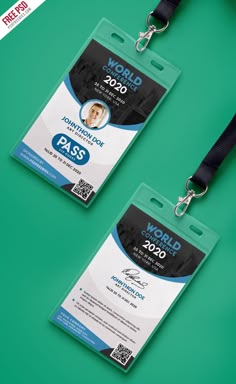 two id cards with lanyards attached to each other on a green background,