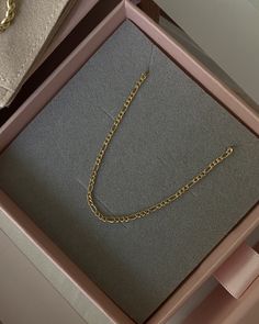 Product Description Our Gianna chain is as classic as the Italian chain gets. One of the most popular chains in our collection, she's perfect for layering with multiple necklaces for a sophisticated look. She's tarnish-resistant, showerproof, and gentle on the skin so you can wear her wherever your heart desires. …………………………………. D E T A I L S • Chain length comes in three lengths: measures 16, 18, or 20 inches • Chain thickness measures 1.5 mm • Spring clasp • 100% 18k Gold Filled • Tarnish-resis Elegant Figaro Chain Bracelet, Elegant Figaro Chain Necklace For Layering, Figaro Chain Link Necklace Gift, Classic Double Chain Bracelet Gift, Dainty Double Chain Necklace For Gift, Elegant Figaro Chain Bracelet As Gift, Elegant Figaro Chain Bracelet Gift, Elegant Figaro Chain Link Bracelet, Classic Double Chain Necklace For Gift