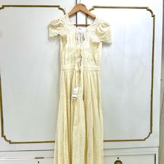 This Is An Absolutely Gorgeous Off-White, Eyelet Lace Never Worn With Tags On It Urban Outfitters Dress. Multiple Ties In Back. Sadly It’s Just Too Small For Me. The Measurements Are Waist 30 In 32-38in Variable In Bust 49 Long Summer Daywear Maxi Dress With Broderie Anglaise, Summer Broderie Anglaise Maxi Dress For Daywear, Broderie Anglaise Maxi Dress For Summer Daywear, Fitted Broderie Anglaise Maxi Dress For Spring, Fitted Broderie Anglaise Maxi Dress For Summer, Chic Broderie Anglaise Maxi Dress For Vacation, Summer Beige Broderie Anglaise Dress, Urban Outfitters Short Sleeve Midi Dress For Spring, White Midi Dress From Urban Outfitters