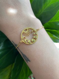 $24 Gold Bracelets With Adjustable Chain For Festival, Bohemian Brass Bracelets With Adjustable Chain, Bohemian Gold Bracelet With Adjustable Length, Celestial Gold Jewelry For Festivals, Adjustable Mystical Moon Phase Jewelry, Mystical Adjustable Moon Phase Jewelry, Bohemian Gold Charm Bracelet In Brass, Adjustable Brass Charm Bracelet, Adjustable Brass Sun And Moon Design Jewelry