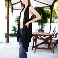 Elevate your beach look or casual outfit with the Anna-Kaci Women's Sleeveless Open Front Crochet Shawl Cardigan Bikini Cover Up. This versatile piece serves as a stylish bikini cover-up, adds a chic touch to any casual ensemble, and makes a perfect gift for the fashion-forward individual in your life. Sleeveless Beach Tank Top, Black Stretch Casual Cover-up, Casual Black Stretch Cover-up, Black Vest For Beach In Summer, Versatile Beach Tank Top, Versatile Open Front Summer Tops, Versatile Black Summer Tank Top, Beach V-neck Stretch Vest, Stretch V-neck Vest For Beach