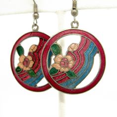 "Vintage floral enamel earrings in red, royal blue and pink cloisonne enamel. They measure 1\" in diameter and are x 2\" tall including the loop. Earrings are in very nice condition. Thanks for looking! vintagedame.etsy.com I have more vintage jewelry in the shop: https://www.etsy.com/shop/vintagedame?section_id=5537284&ref=shopsection_leftnav_6 Check out my other shops! selvedgeshop.etsy.com shoutout.etsy.com pillocraft.etsy.com" Red Enamel Pierced Earrings, Red Pierced Enamel Earrings, Red Enamel Round Earrings, Red Round Enamel Earrings, Multicolor Enamel Jewelry, Vintage Red Enamel Earrings, Vintage Multicolor Enamel Earrings, Red Enamel Vintage Earrings, Red Enamel Drop Earrings