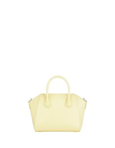 Antigona Handbag Luxury Yellow Bag With Top Carry Handle, Yellow Top Handle Evening Bag, Classic Yellow Shoulder Bag With Top Carry Handle, Evening Yellow Satchel With Top Carry Handle, Yellow Evening Satchel With Top Carry Handle, Luxury Yellow Crossbody Bag, Classic Yellow Top Handle Bag, Elegant Yellow Bag With Detachable Strap, Yellow Evening Bags With Handles