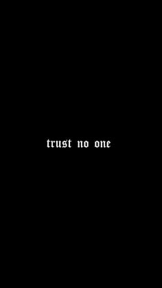 the text trust no one is written in white on a black background