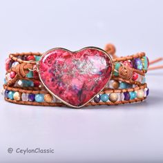 PLEASE READ THIS DESCRIPTION CAREFULLY!  First of all, you are warmly welcomed to my newly started Etsy shop!  This High-quality unique Spiritual Heart Shape Triple stands Jasper wrap Bracelet made by Jasper, Crystal, Metal & Genuine Leather. Size is Around 20 inches +3 Closures.it is 100% handmade and of exquisite quality.  This classy cute bracelet can be delivered to some countries like the UK within 7-14 DAYS. These days this necklace is available at a SPACIAL DISCOUNT and I can guarantee 10 Heart-shaped Beaded Bracelets With Natural Stones For Gift, Heart-shaped Natural Stone Beaded Bracelets For Gifts, Heart-shaped Natural Stone Beaded Bracelets As Gift, Heart-shaped Natural Stone Beaded Bracelet Gift, Heart-shaped Adjustable Gemstone Beads Bracelet, Heart-shaped Healing Beaded Bracelets, Adjustable Gemstone Beads Jewelry For Valentine's Day, Heart-shaped Gemstone Beads Bracelets For Gift, Heart-shaped Gemstone Beads Bracelets As Gift