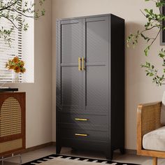 a tall black cabinet with gold handles next to a chair and potted plant in a living room