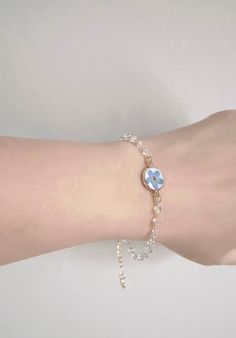 Thank you for visiting Fleur_Belles! ✨💙This Forget Me Not bracelet is linked with Clear Quartz Crystal. They are so gorgeous💙✨  Chain length: 14 chain with 5cm extender Pendant size: 1cm x 1cm 🌺Due to the handmade nature of this product, slight variations may occur, however, the design remains as similar as possible. 💖CARE about the handmade accessories 💖 Please keep in a dry place and avoid prolonged direct sunlight, water, chemicals and perfumes to maintain and preserve the beauty. Handmade Delicate Blue Bracelets, Dainty Blue Crystal Bracelet For Gift, Blue Dainty Crystal Bracelet Gift, Dainty Blue Crystal Bracelet Gift, Blue Flower Bracelets For Friendship, Blue Flower Bracelet For Friendship, Blue Flower Friendship Bracelet, Not Bracelet, Bracelets Christmas