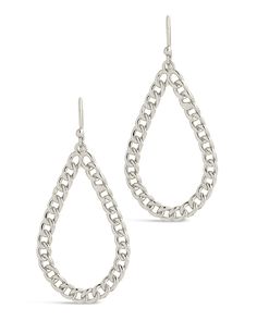 The Nikole Dangle Earrings have style dripping off of them! Show off your trendsetting side with the unique chain link detail and teardrop dangle. Get ready to make a fashion statement with these earrings - they'll ensure you shine brighter than the stars! Material: 14K gold or rhodium plated brass Features: 1.75" drop, 0.8" width, Lead & Nickel free, fish hook post Modern Drop Earrings With Silver Chain, Modern Silver Chain Drop Earrings, Modern Silver Chain Earrings, Trendy Teardrop Dangle Earrings For Party, Trendy Silver Chain Link Earrings, Modern Metal Teardrop Earrings For Party, Trendy Nickel-free Dangle Chandelier Earrings, Trendy Nickel Free Dangle Chandelier Earrings, Chic Metal Drop Jewelry