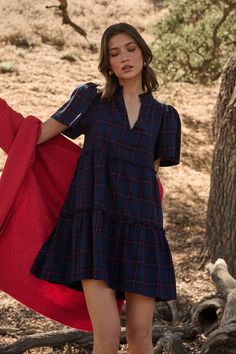 Good days come easy when you're wearing the Amelia Tiered Babydoll Short Sleeve Dress. This pretty plaid pattern features a banded collar, split neckline with short sleeves. Side pockets are added for convenience. You can easily wear it with heels for a complete look. - Plaid- Split neck- Pockets- Puff sleeves- Color: Navy RedSize + Fit - Model is 5'9" and wearing size XS- Measurements taken from size S - Chest: 19 1/2"- Length: 34 1/2" Fabric Self: 100% Cotton, Lining: 97% Polyester 3% Spandex Wrap Jumpsuit, Bra Dress, Body Dress, Curve Dresses, Skirt Leggings, Short Sleeve Dress, Active Wear Tops, Dresses With Leggings, Dress Backs