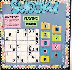 a bulletin board that has been decorated with numbers and letters for sudokui to play