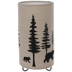 a black and white vase with trees on it