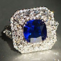 a large blue and white diamond ring