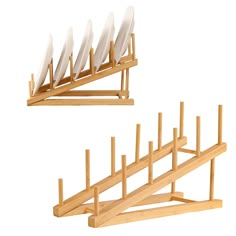 two wooden racks with white plates on them