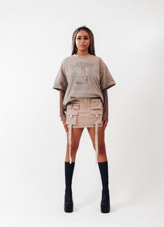 Get ready to amp up your streetwear game with our freshest creation - introducing the ACS Mini Cargo Skirt! We've poured our techwear and streetwear passion into this beauty, and we can't wait for you to experience it firsthand. *Intricate Design, Striking Look: Dive into the dynamic front design, featuring cargo pockets and hanging straps. This combination crafts a unique silhouette that effortlessly catches attention, making each step a statement. *Beige Colorway: Elevate your wardrobe with the versatile light beige hue. It effortlessly complements your existing collection, offering a canvas for endless creative pairings. *Perfect Mini Length: The ACS Mini Cargo Skirt strikes the ideal balance between mini and comfort  *Customized Comfort, Adjustable Waistband: Experience the luxury of a Y2k Streetwear Skort With Pockets, Trendy Mini Skirt With Pockets For Streetwear, Streetwear Mini Skort With Pockets, Streetwear Bottoms With Pockets In Mini Length, Streetwear Mini Bottoms With Pockets, Mini Bottoms With Pockets For Streetwear, Y2k Style Mini Skort For Streetwear, Y2k Fitted Skirt For Streetwear, Y2k Mini Skirt For Streetwear