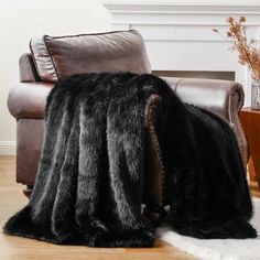 a chair with a furry blanket on top of it