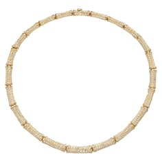 Dazzling vintage Cartier Bamboo necklace showcasing approximately 20 carats of fine-white brilliant round diamonds impeccably set in lustrous 18 karat yellow gold. The necklace rests effortlessly and comfortably on the collar, allowing for full display of its exceptional radiance. It consists of 22 segments, each encrusted with scintillating diamonds of finest Cartier quality. Each segment is masterfully designed as a finely textured bamboo stalk that exhibits exquisite sculptural quality. The d Vintage Cartier Necklace, Bamboo Necklace, Cartier Diamond, Cartier Gold, Dope Jewelry Accessories, Cartier Necklace, Glamour Vintage, Casual Necklaces, Diamond Tennis Necklace