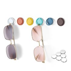 PRICES MAY VARY. 6 PCS Colorful Sunglasses Holder - Diameter of each holder: 1.2 inches. You can neatly store up to 6 pairs of sunglasses. It's the perfect solution for organizing sunglasses without taking up a lot of space. Simple but Useful - With a 180° folding design, the sunglasses holder organizer can be mounted next to a door, bedside, office desk, dresser, or under cabinet for quick and easy access. Ensuring your sunglasses are always within reach. Installation with Two Options - Simply Sunglasses Storage Organizers, Sunglasses Wall, Sunglass Display, Closet Storage Accessories, Eyewear Display, Sunglasses Organizer, Sunglasses Display, Sunglasses Storage, Sunglasses Holder